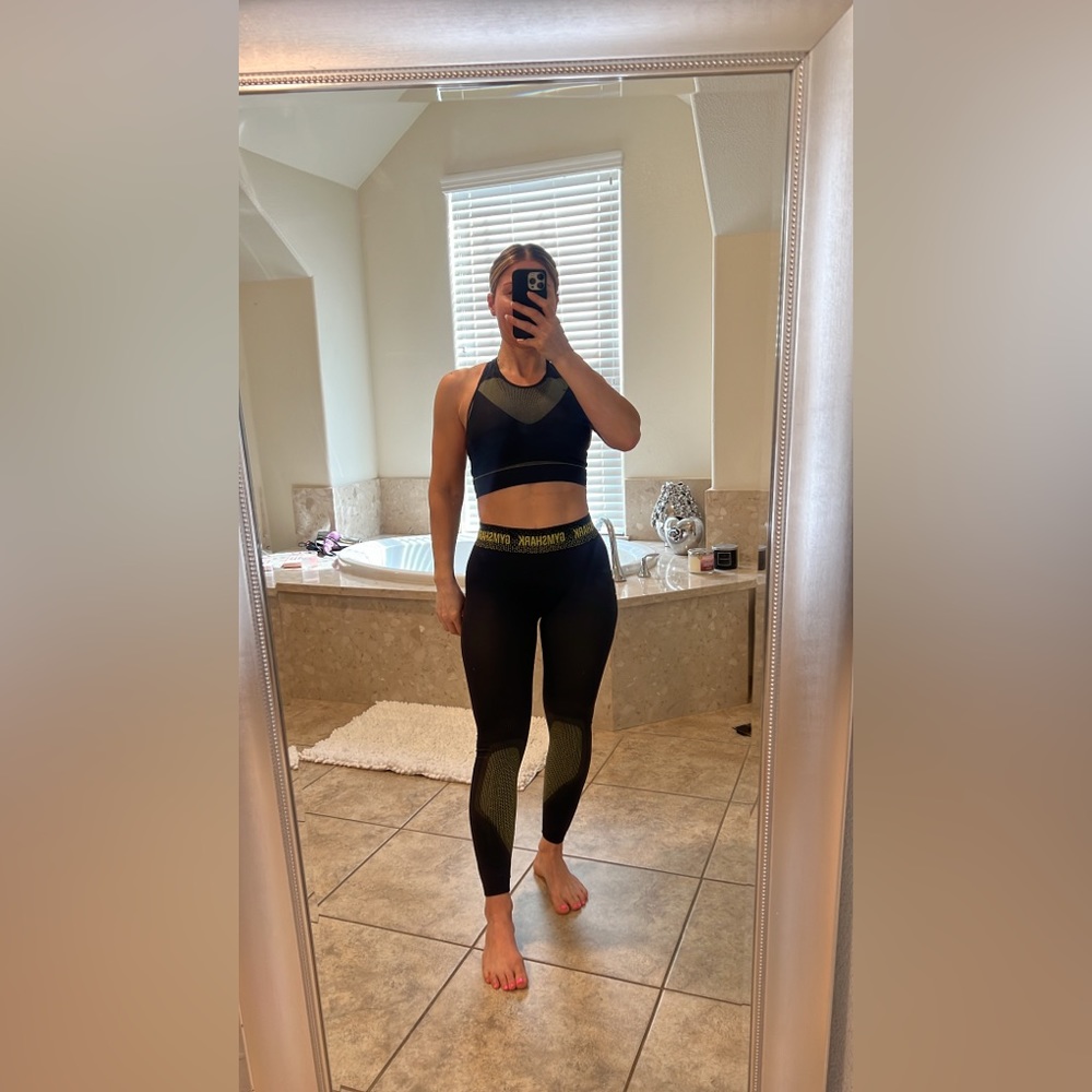 Gym shark top and bottom  bottom is in small size and the top is medium size.